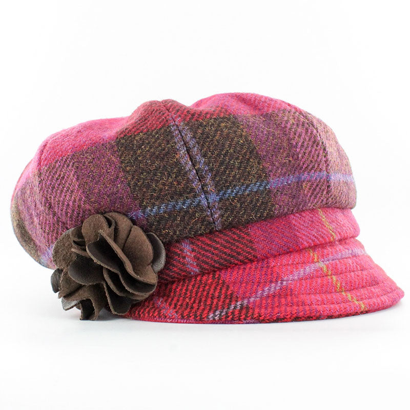 100% Wool with elasticated back for comfort fit. One size fits all.